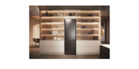 A fridge freezer positioned under a staircase in a modern home