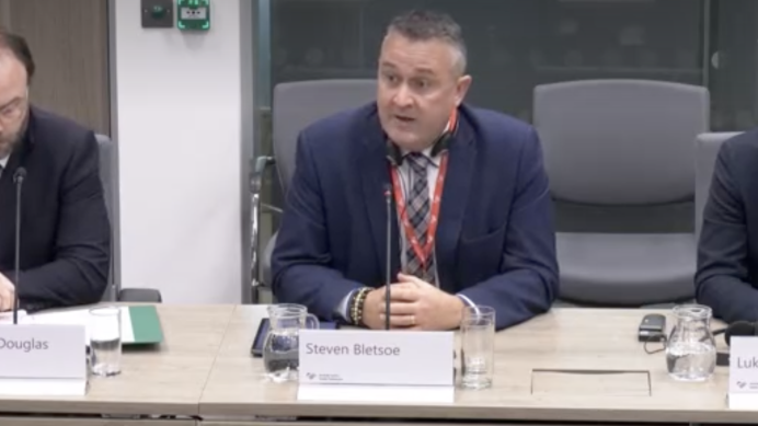 Steve Bletsoe giving evidence at the Senedd